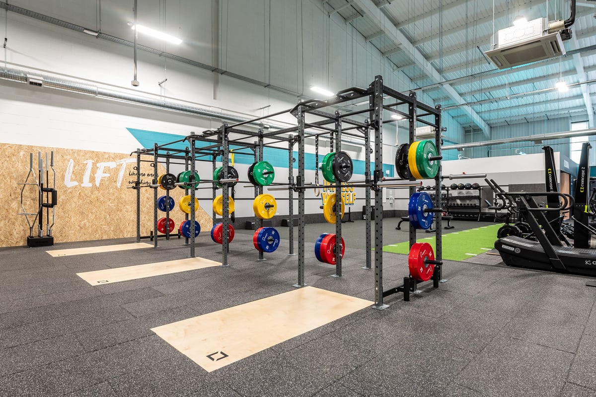 PureGym Winchester: Weightlifting racks, colourful bumper plates, plyo boxes, and rubberized gym flooring.