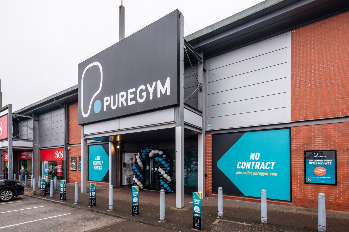 PureGym Wrexham: Puregym storefront facade with signage, windows and entrance.