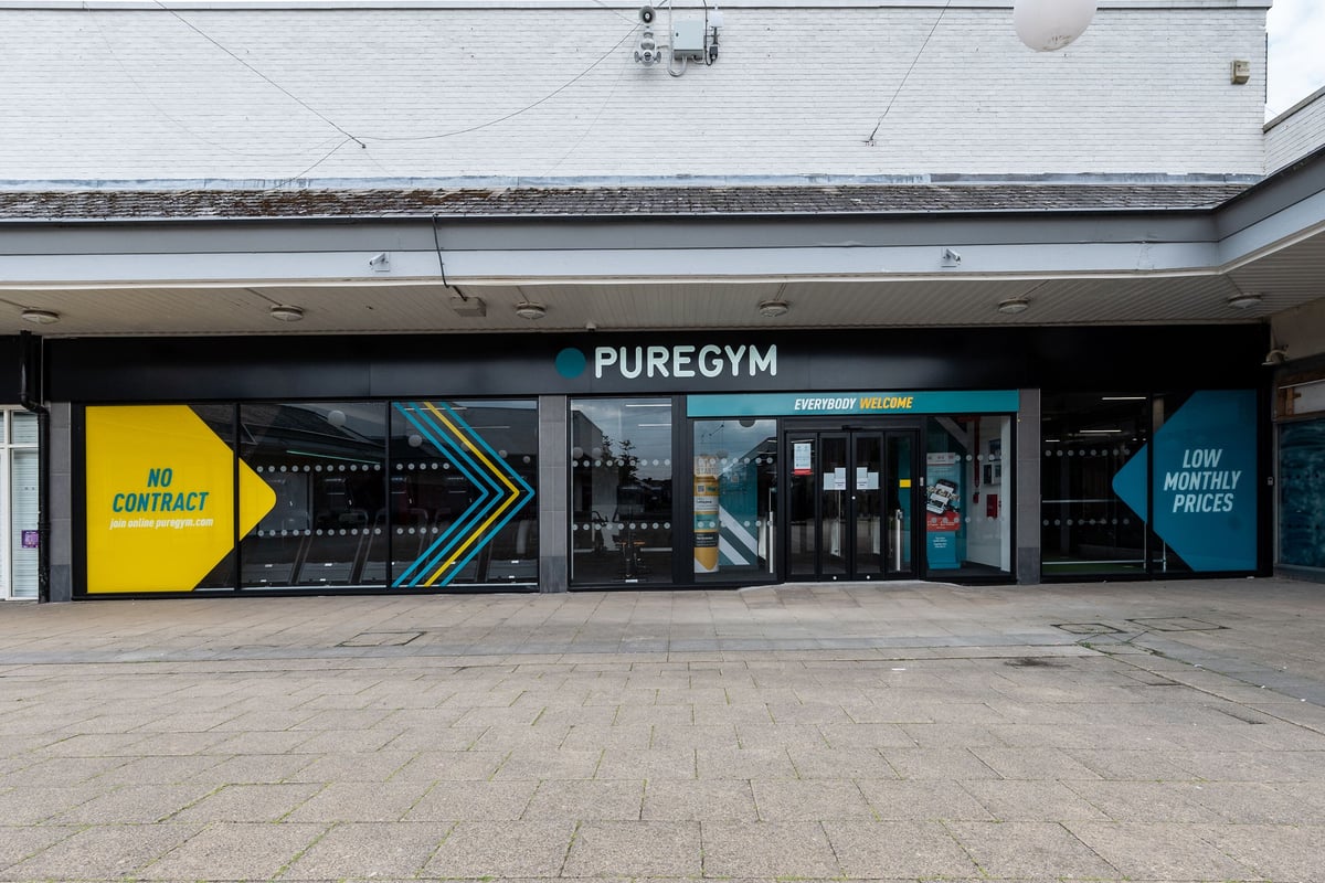 PureGym Coalville: Gym frontage with branding, no-contract signage, and window displays showcasing equipment.