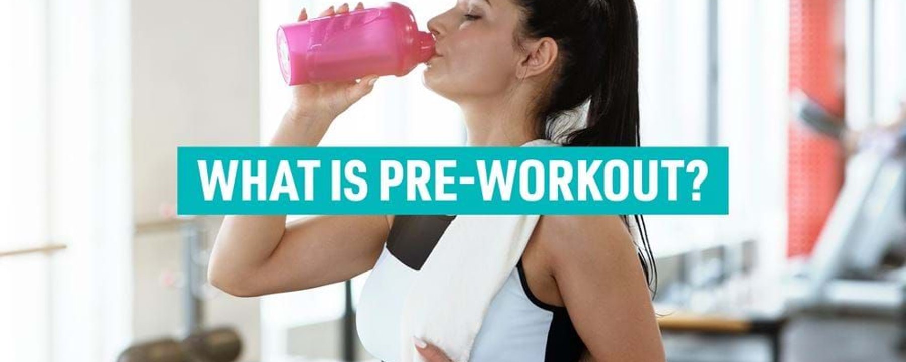 Woman in gym drinking from pink bottle with towel around neck and text overlay