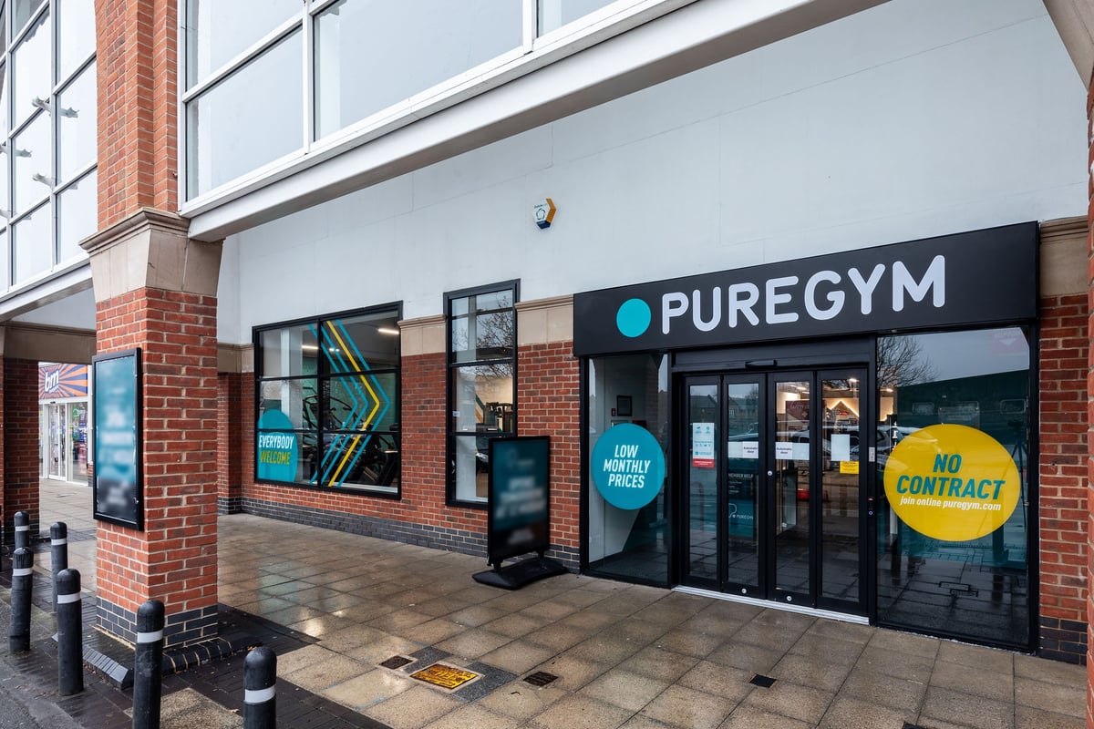 PureGym Wantage: The exterior of a Pure Gym fitness center with brick facade and signage.