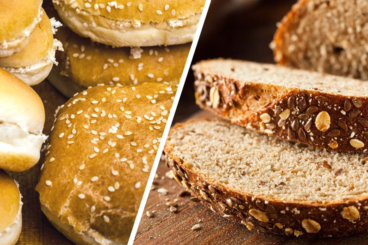 Assorted bread rolls with sesame seeds and sliced whole grain bread with seeds
