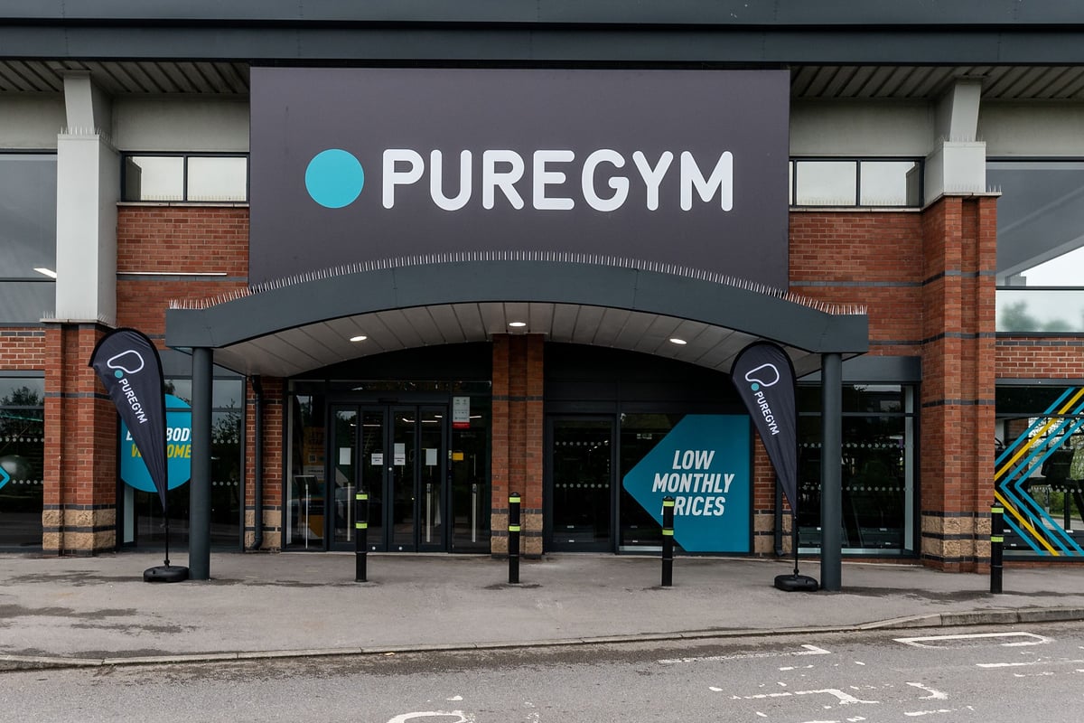 PureGym Doncaster: Pure Gym storefront with signage, banners advertising low monthly prices.
