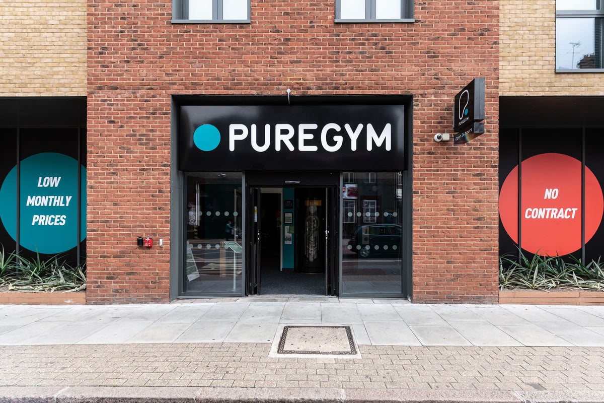 PureGym London Camberwell New Road: Pure Gym with teal branding, displaying "LOW MONTHLY PRICES" and "NO CONTRACT" offers.