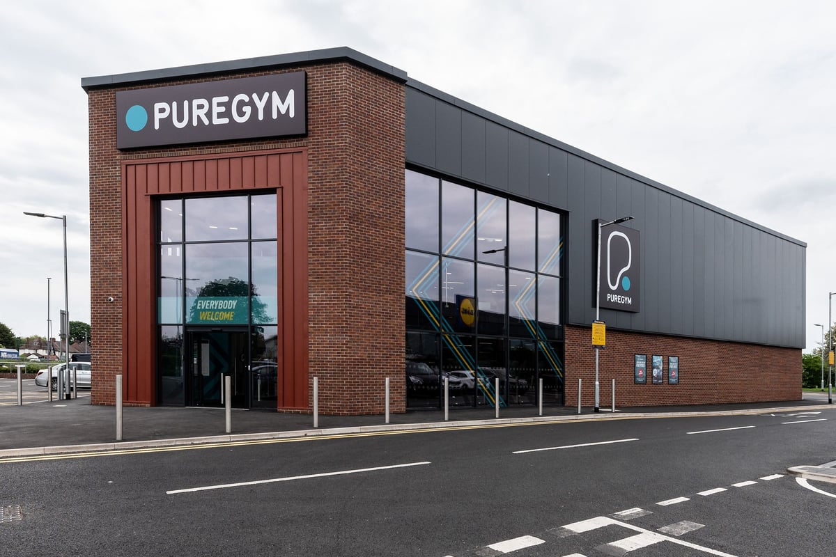 PureGym Nottingham West Bridgford: Brick exterior of a gym facility named PureGym with large windows.