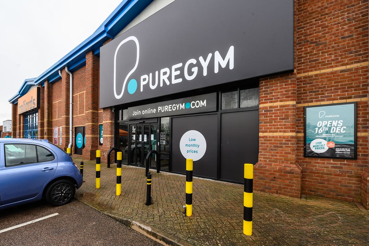 PureGym Burgess Hill: Gym exterior with signage, bollards, and parking area visible.
