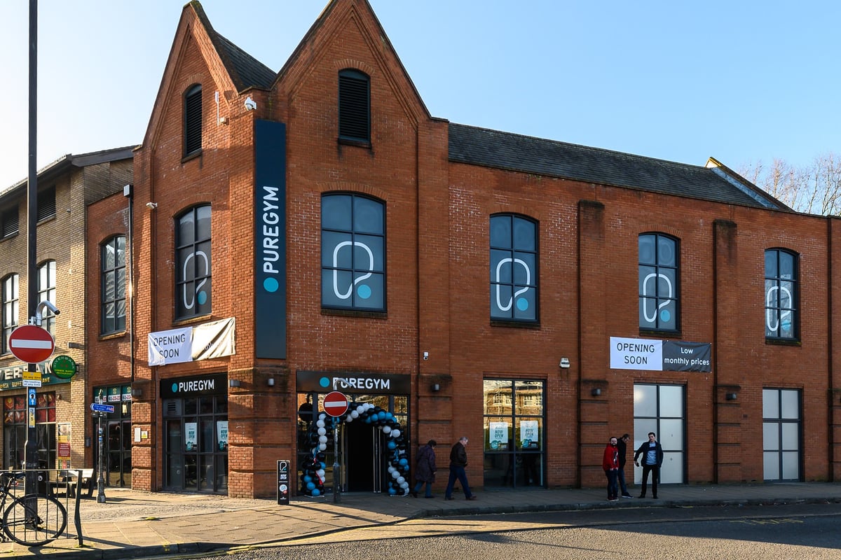 PureGym Norwich Riverside: Brick building exterior with large windows and gym signage.