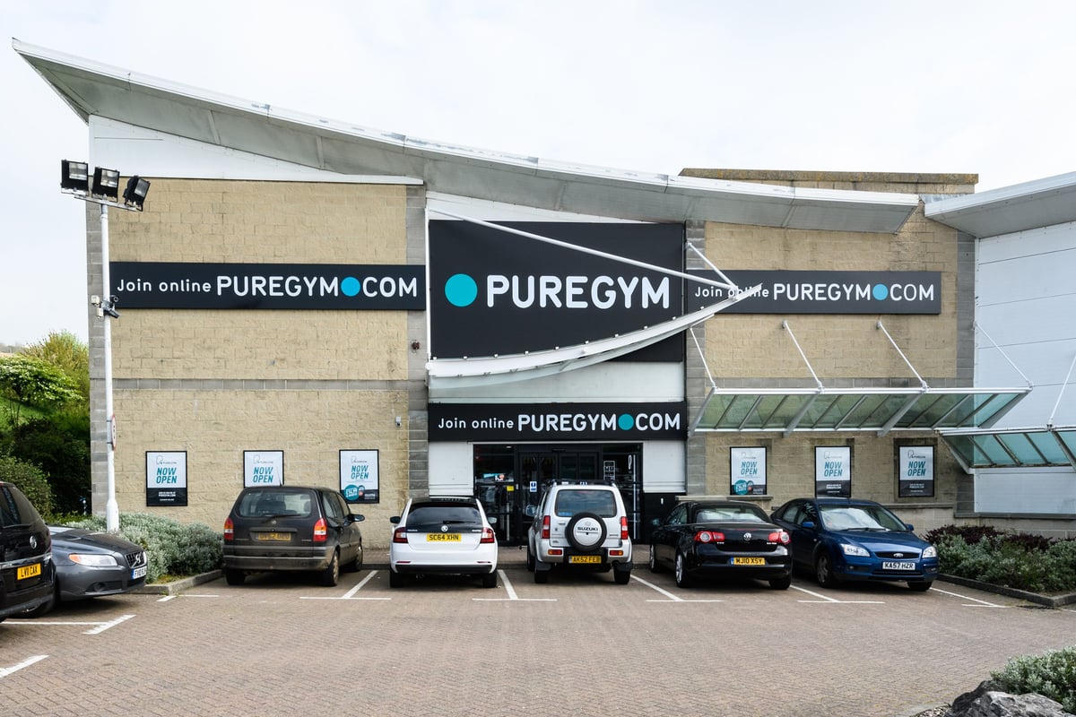 PureGym Folkestone: Gym exterior facade with parking area and PureGym branding.