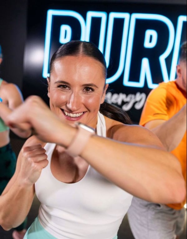 PureGym member taking part in a BodyCombat class