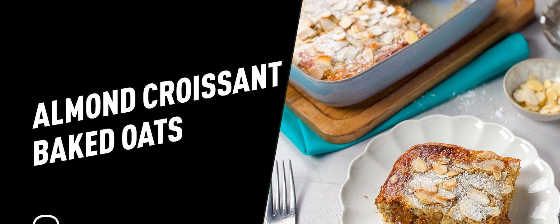 Baked almond croissant oats topped with sliced almonds and powdered sugar on a plate