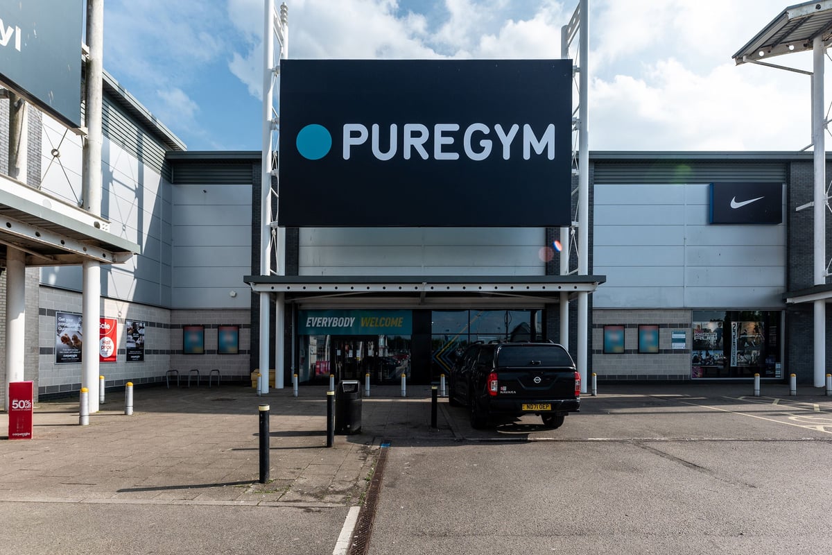 PureGym Durham City Retail Park: Gym exterior with signage and vehicle parked outside.