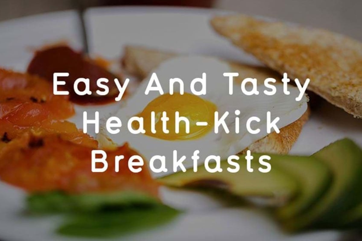 Breakfast plate with smoked salmon, poached egg, wholemeal toast and sliced avocado