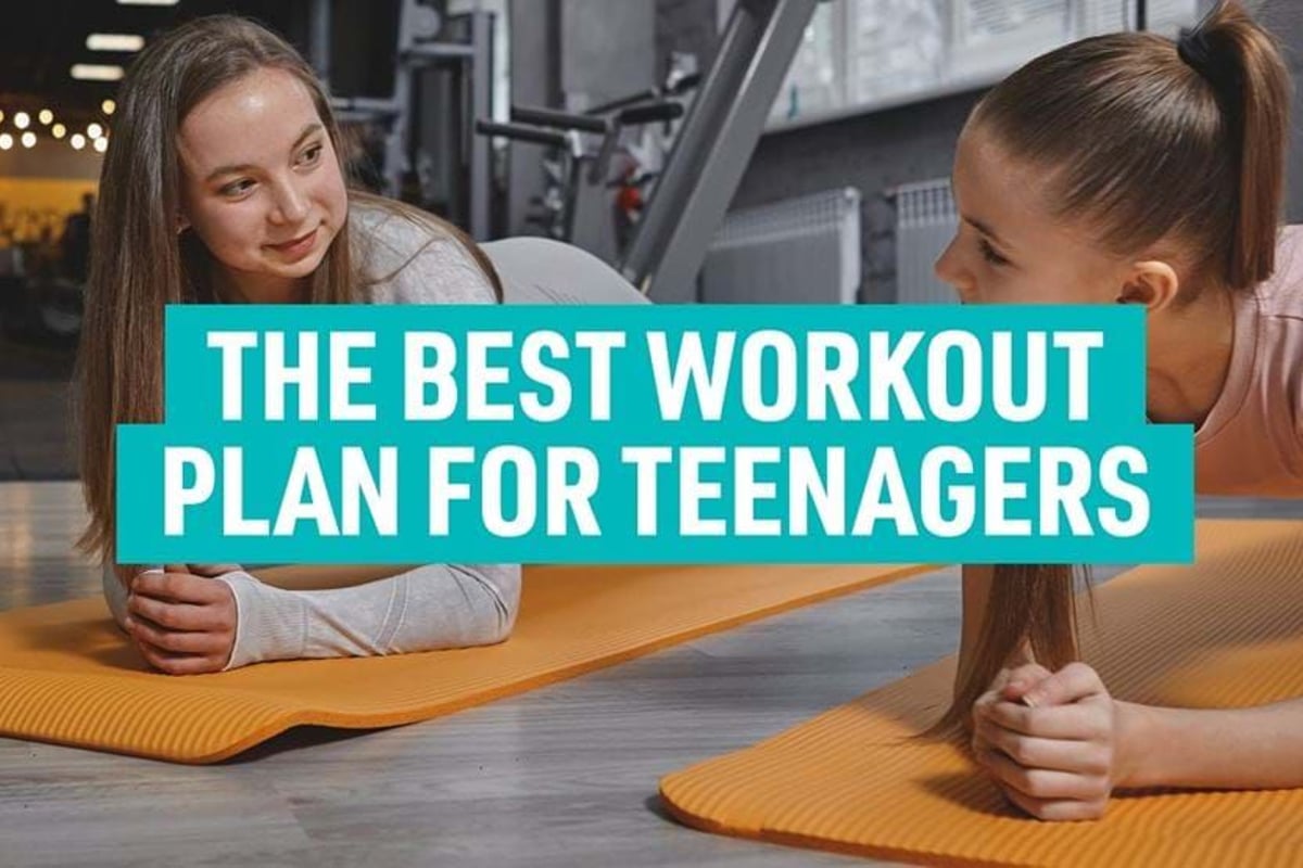 Two teenage girls doing planks on orange mats in a gym with workout text overlay