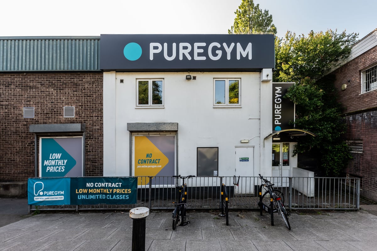 PureGym London Muswell Hill: Gym exterior with bicycles parked outside, signboard displaying "PUREGYM" branding.
