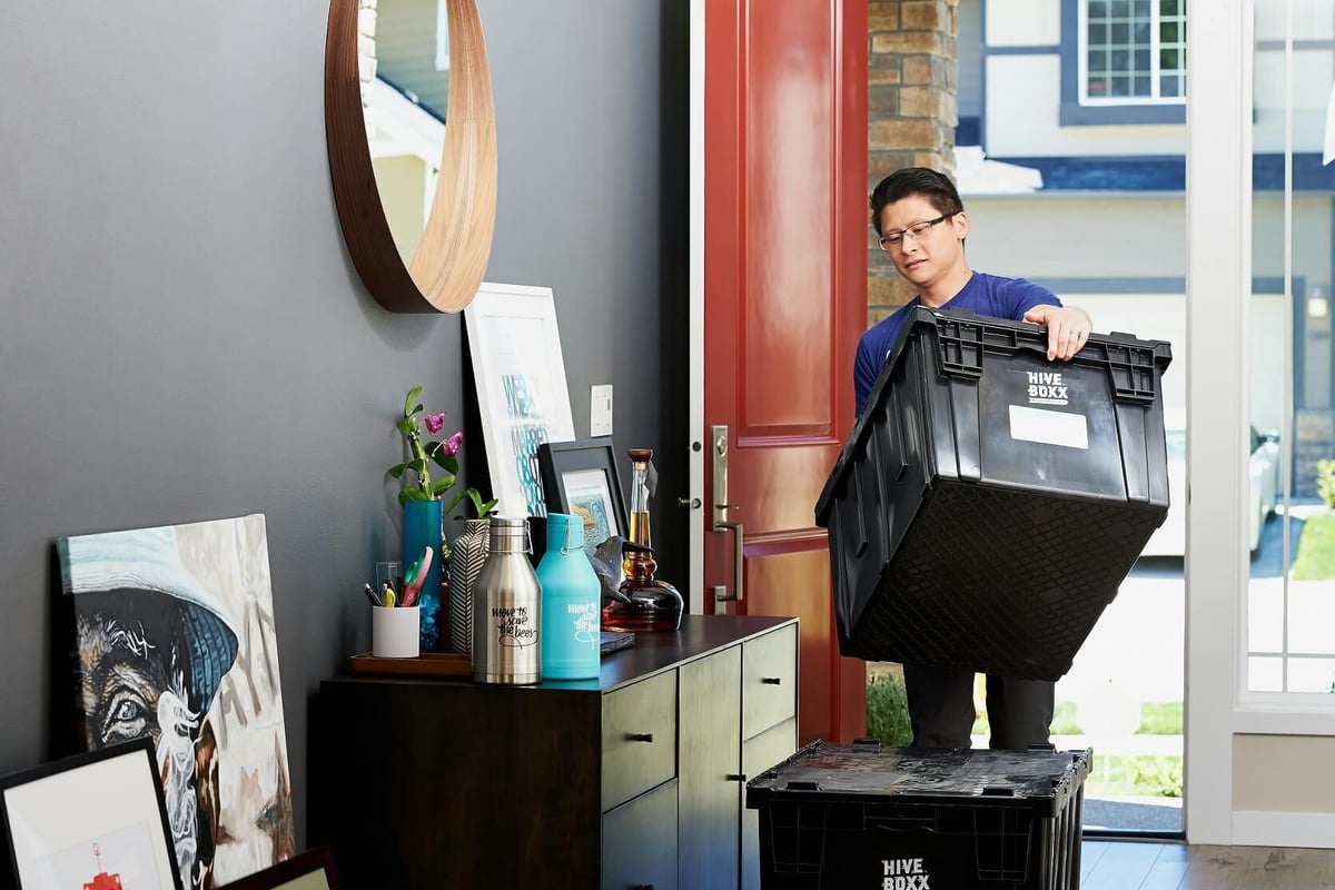 Man moving box