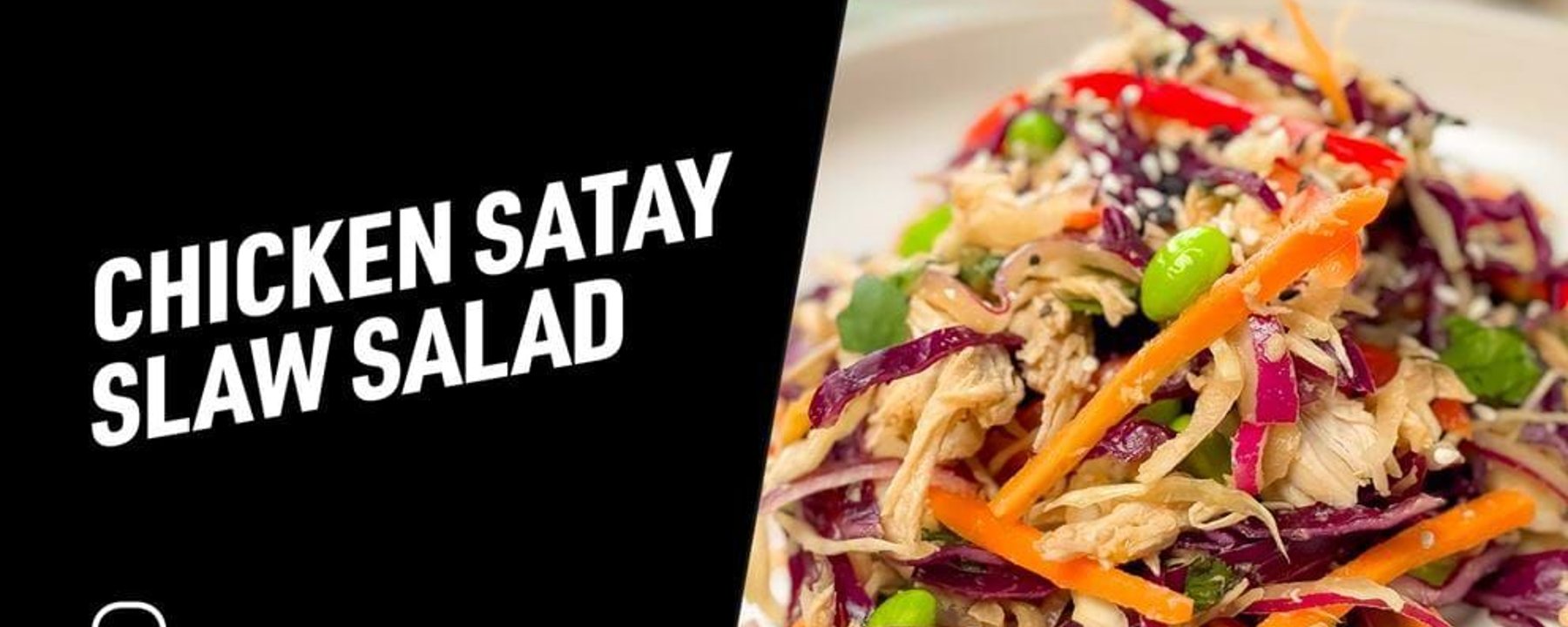 Chicken satay slaw salad with shredded chicken, red cabbage, carrots, and edamame beans