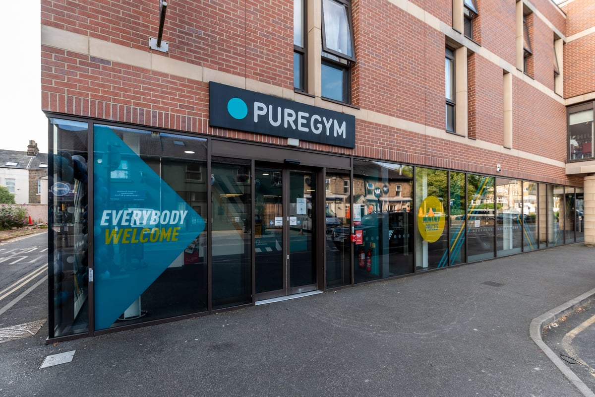 PureGym Harrogate: Storefront of a gym called PureGym with large windows and 'Everybody Welcome' signage.