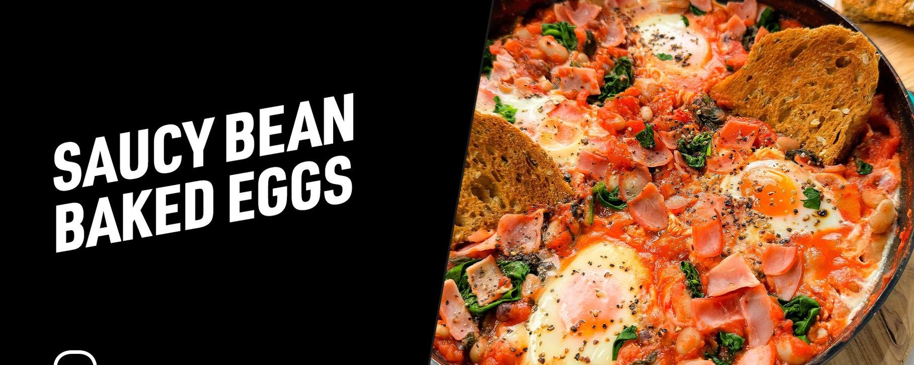 Baked eggs in tomato sauce with spinach, beans, ham, black pepper, and toasted bread.