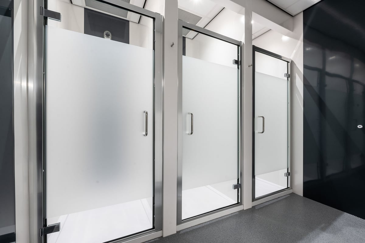 PureGym Walsall Crown Wharf: Stainless steel refrigerated cabinets or lockers in a changing room facility.