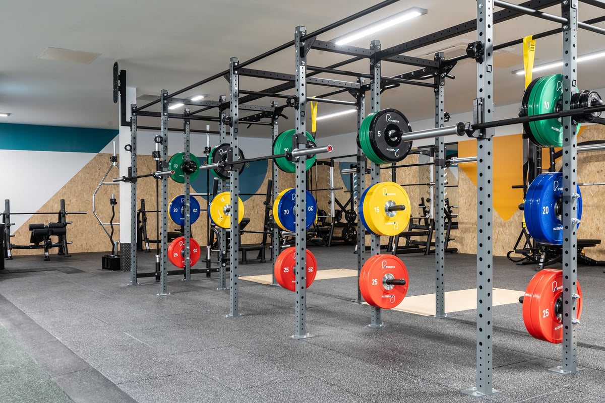 PureGym Airdrie: Power racks, colour-coded weight plates, and rubberised gym flooring.