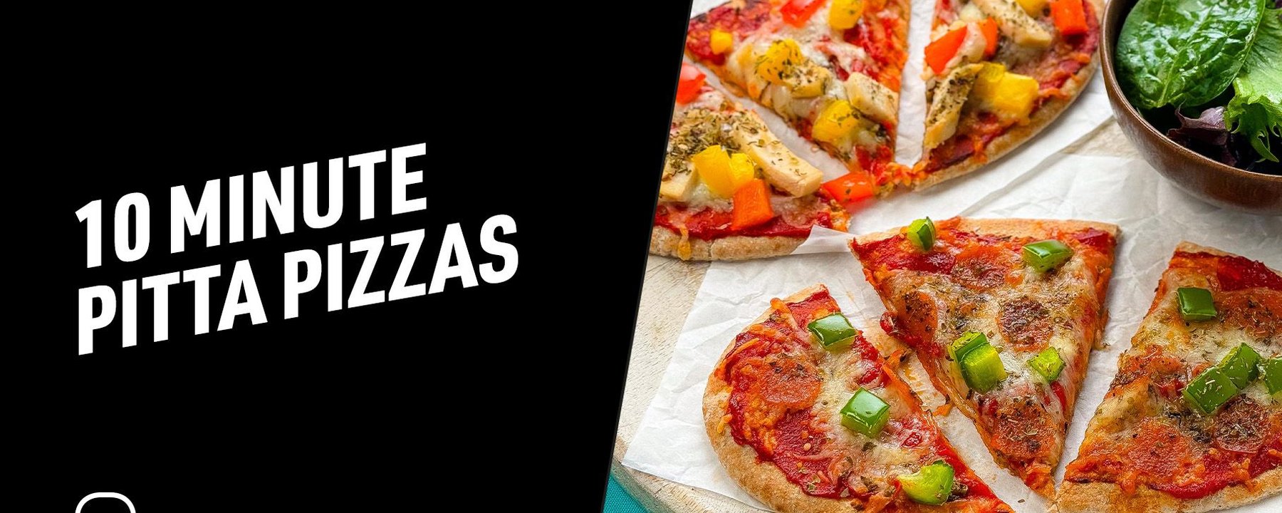 Two small pitta pizzas with vegetables and cheese on a wooden board with salad leaves