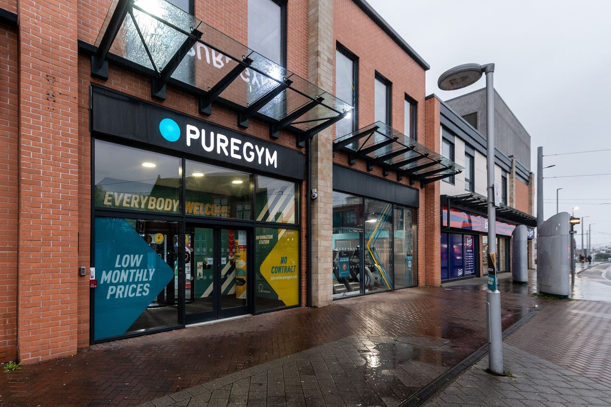 PureGym Nottingham Beeston: Gym exterior with window displays and 'PUREGYM' signage visible.