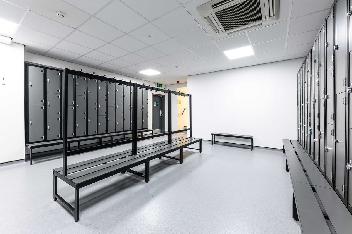 PureGym Poole: Changing room with benches and lockers