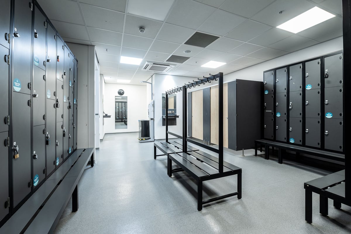 PureGym Norwich Castle Mall: changing room with rows of lockers and benches