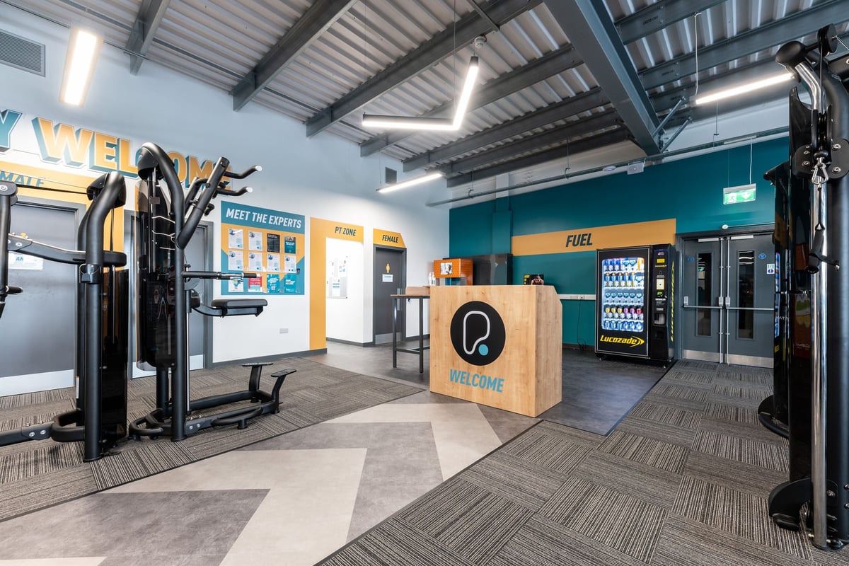 PureGym Yate: Vending machines, welcome desk, fitness equipment rental or check-in area.