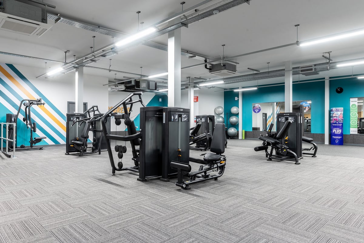 PureGym Torquay Bridge Retail Park: Strength training equipment, cable machines, and adjustable benches.