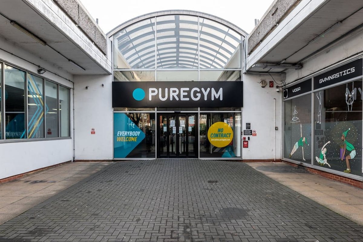 PureGym Purley: Entrance facade of a PureGym fitness club with glass frontage and branding signage.