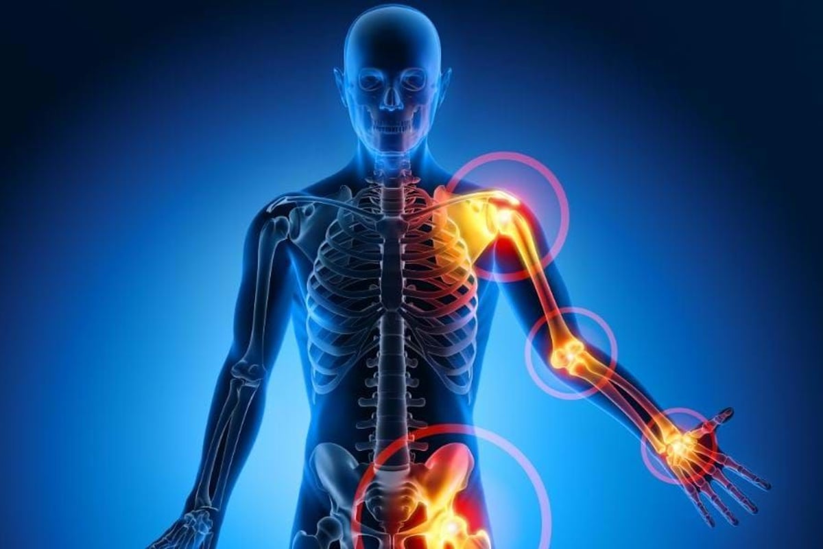 Human skeleton with highlighted pain points in shoulder, elbow, wrist, and hip joints