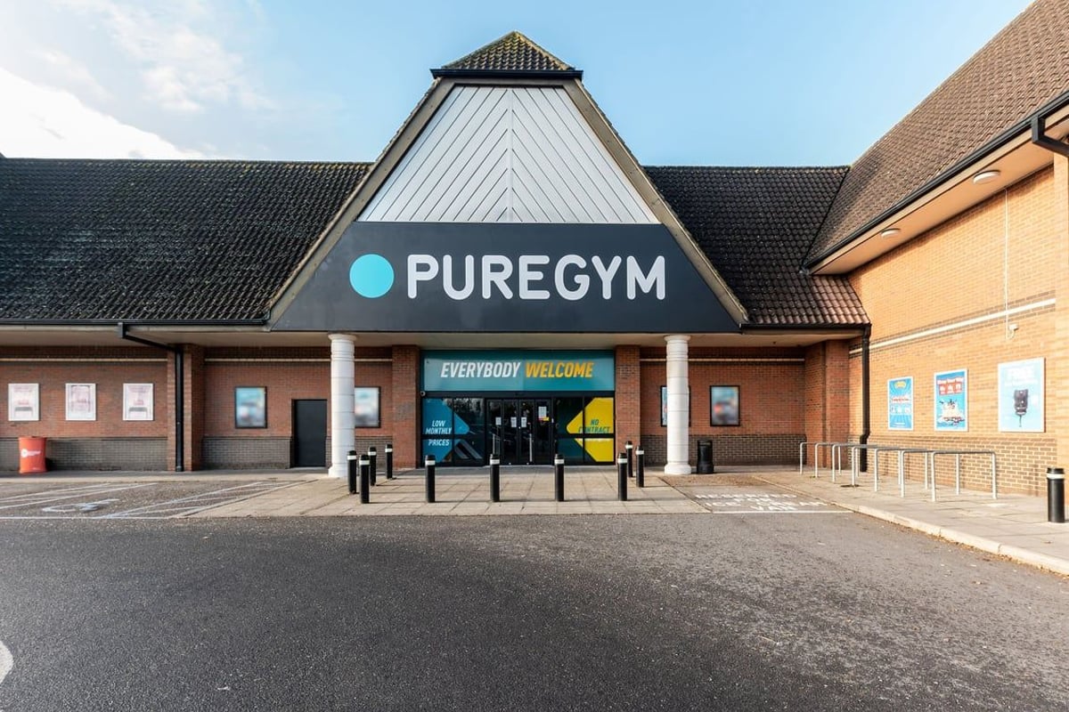 PureGym Watford Waterfields Retail Park: Exterior view of a gym building with signage and parking area.