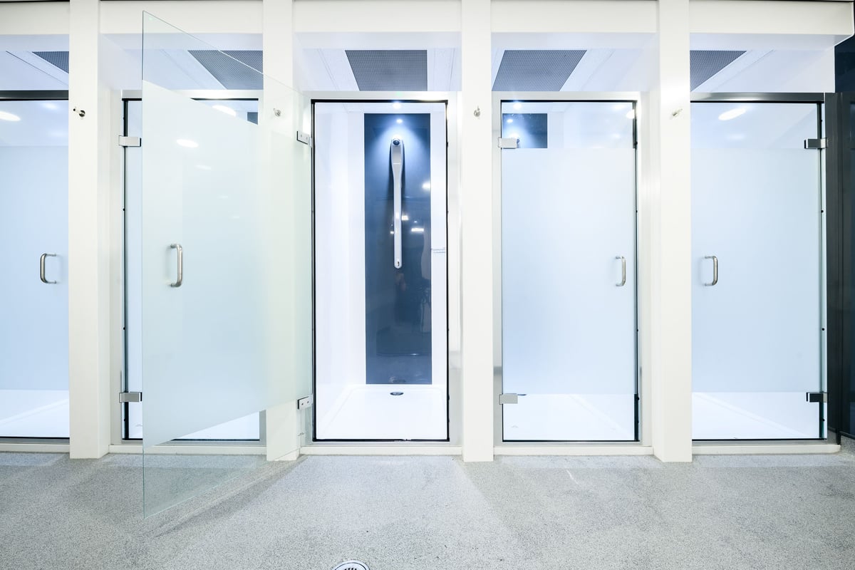 PureGym Basildon: Multiple metal doors, one with a large vertical handle differentiated from the others.