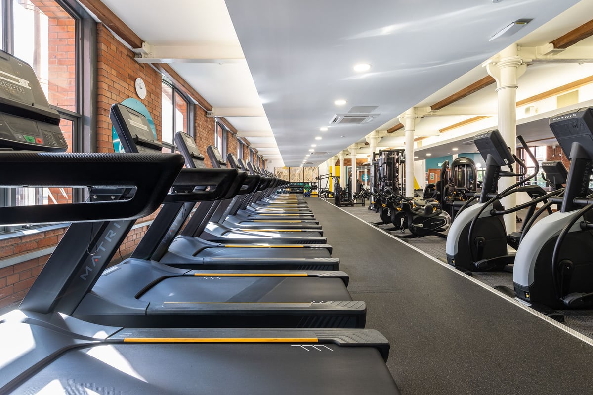PureGym Belfast Adelaide Street cardio area with treadmills and bikes