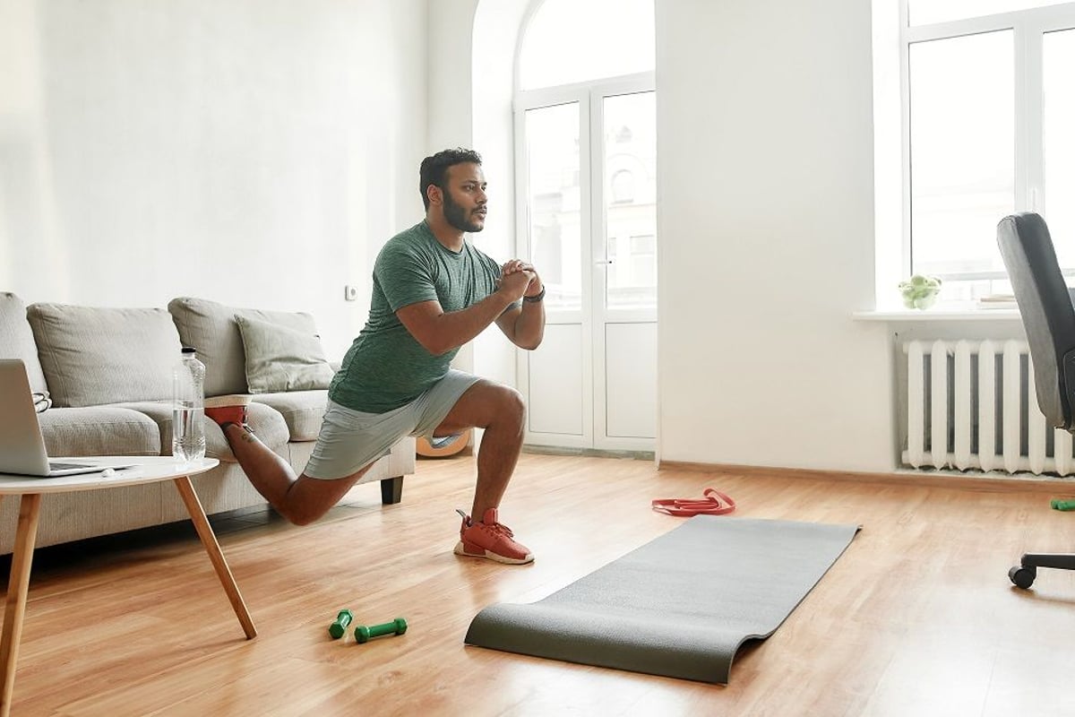 Man doing an exercise in his home