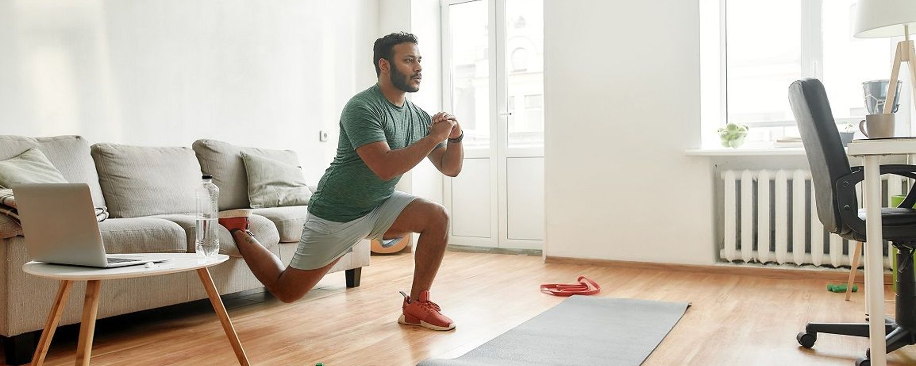 Man doing an exercise in his home