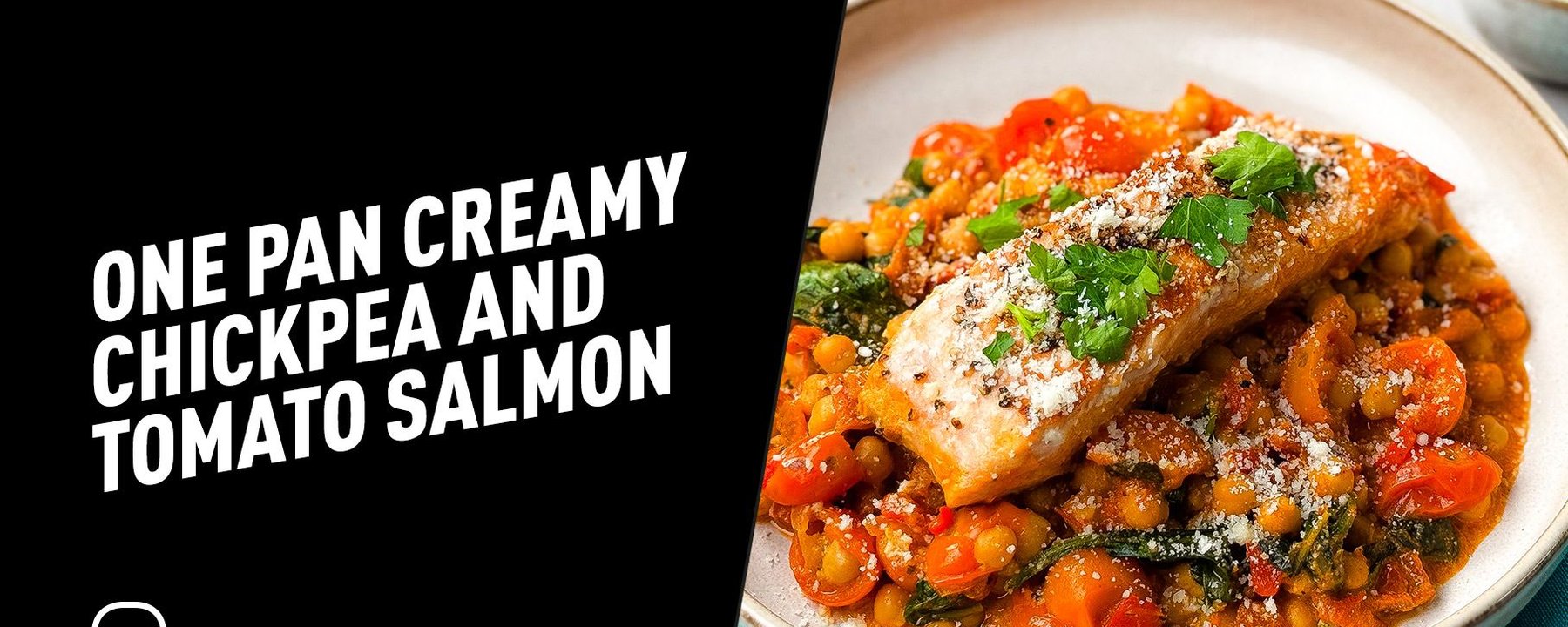 Salmon fillet on creamy chickpea and tomato stew garnished with parsley and cheese