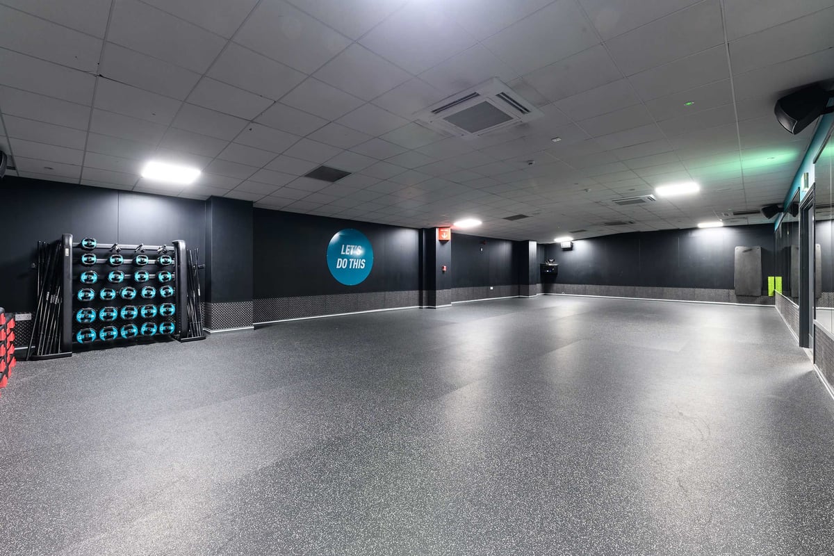 PureGym Poole: spacious gym studio with a rubberised floor