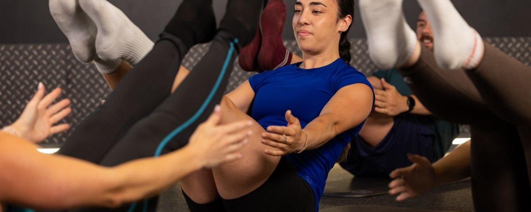 Lady taking part in a Pilates class