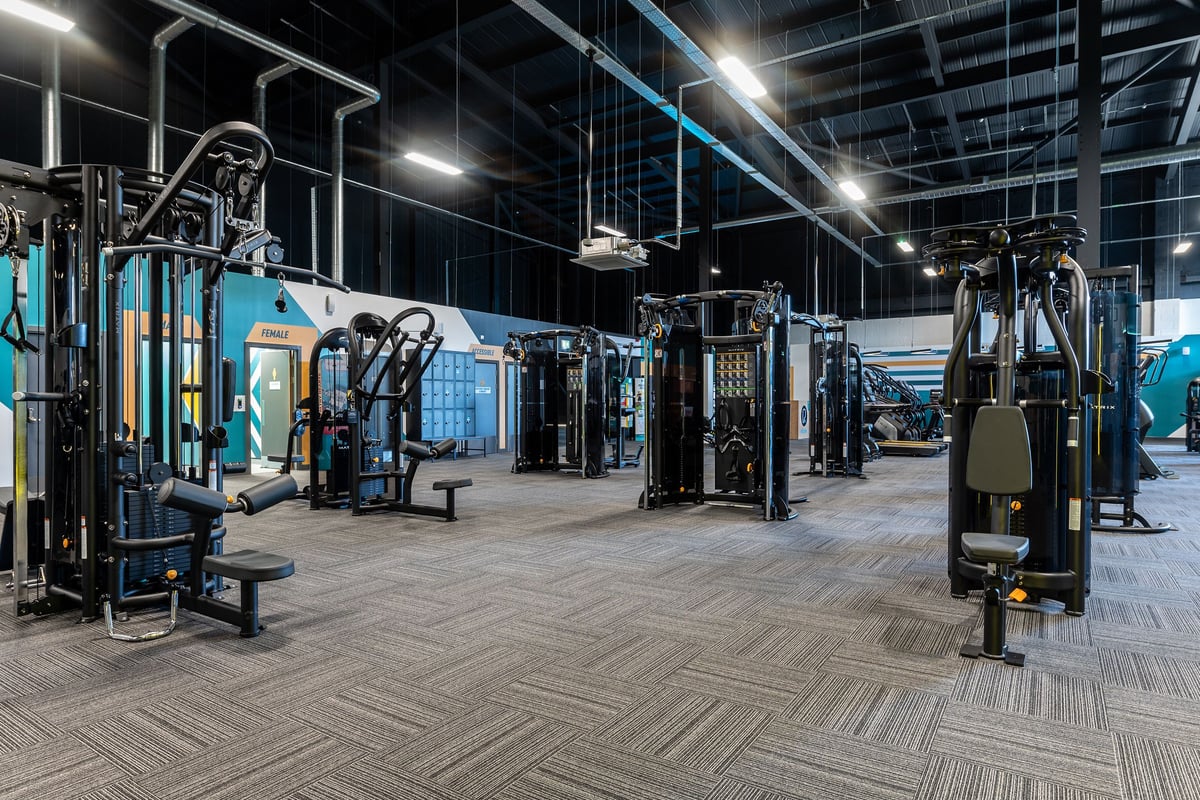 PureGym Stockton-on-tees Teesside Park: Gym studio with resistance machines, cable columns, benches, and rubberised flooring.