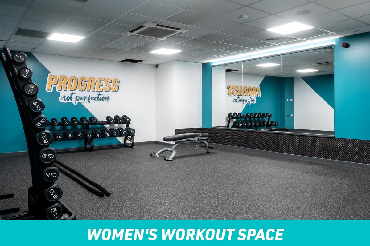 PureGym Rochdale Women's Workout Space: mirror, bench, free weights