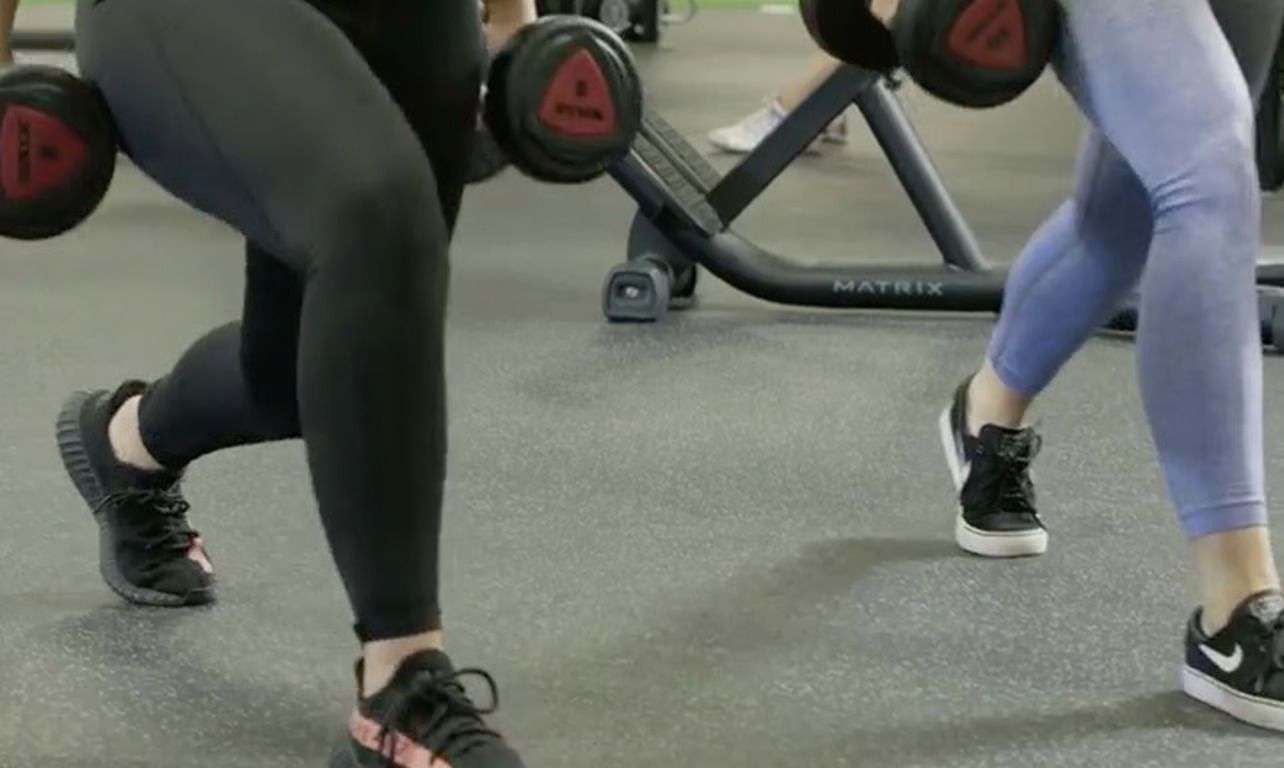 Women doing walking lunges