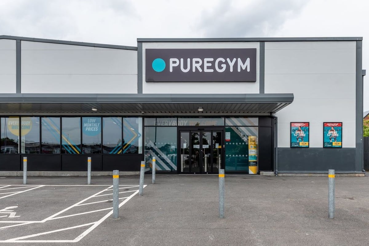 PureGym Barnsley: PureGym exterior with signage, windows showcasing exercise gear and flooring.