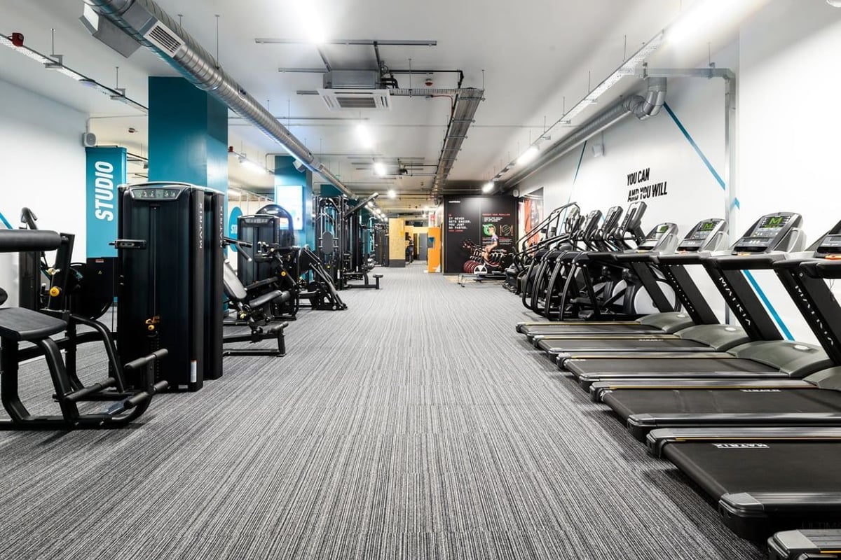 PureGym East Grinstead: Resistance machines, treadmills, free weights, and rubberised flooring inside a gym studio.