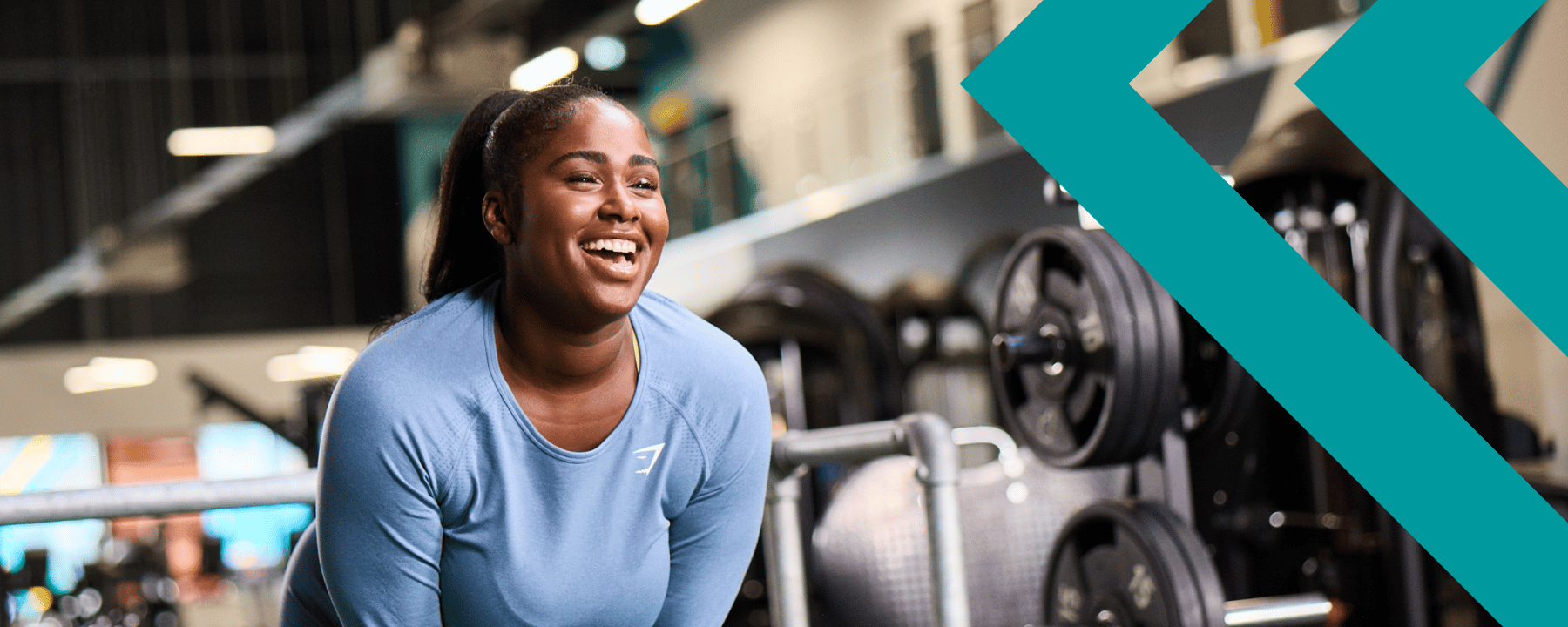woman at the gym laughing