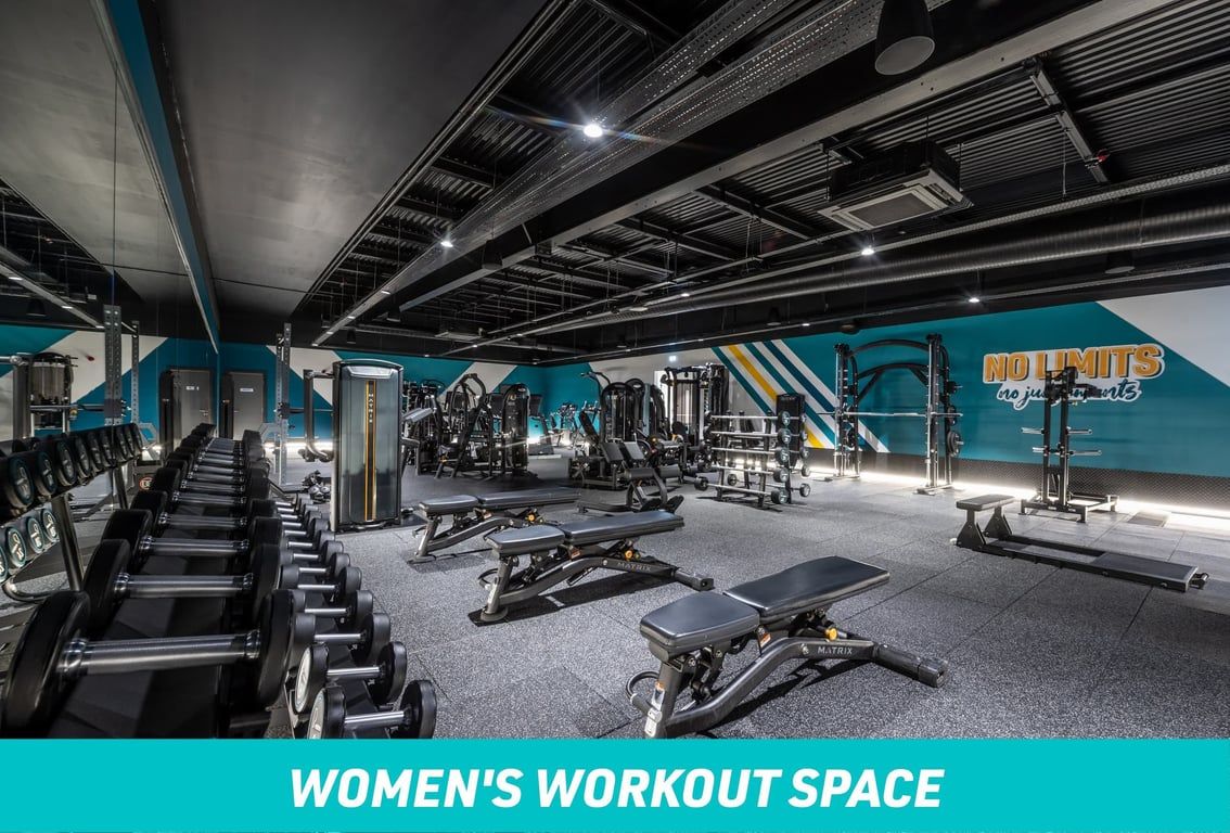 PureGym Manchester Cheetham Hill Women's Workout Space: Free weights area with benches and dumbbells