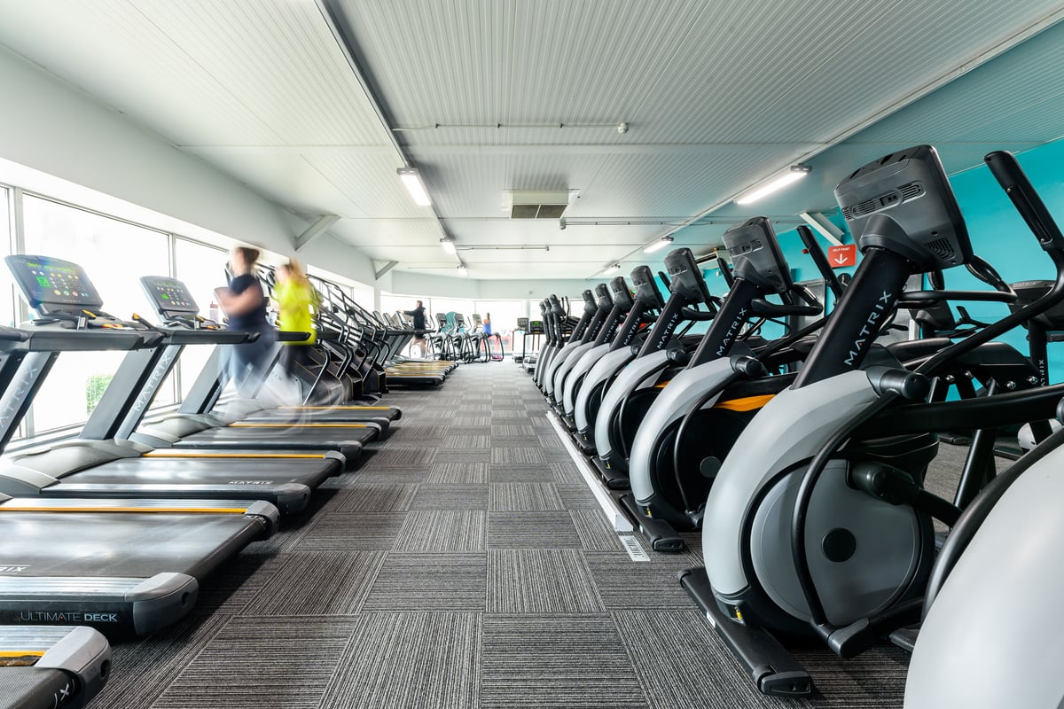 PureGym Poole: Rows of cardio machines in a spacious gym