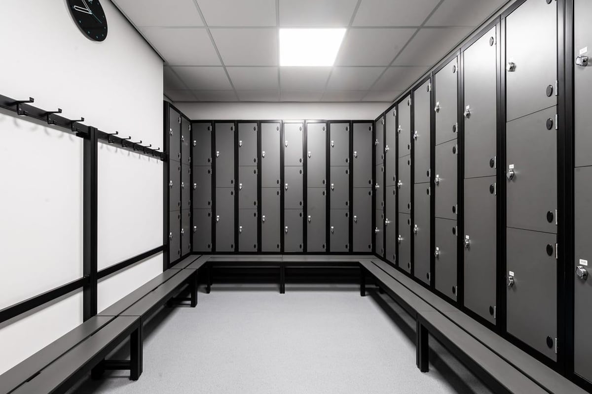 PureGym Inverness Inshes Retail Park: Rows of lockers with combination locks in a changing room.