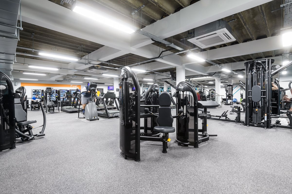 PureGym Brighton London Road: Strength machines, weight racks, benches, rubberized flooring in a well-equipped gym facility.